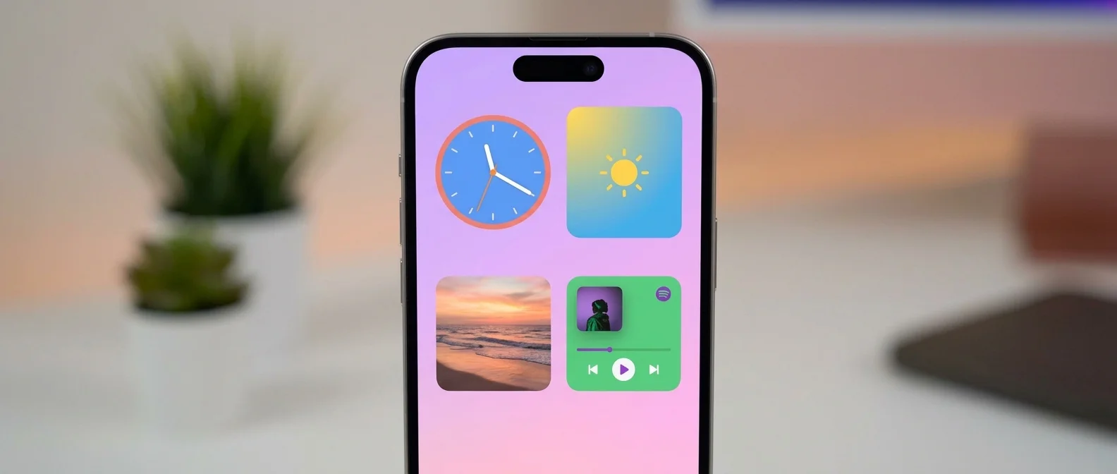 iPhone οθόνη με Liquid Glass widgets και διαφανή εφέ στο iOS 26